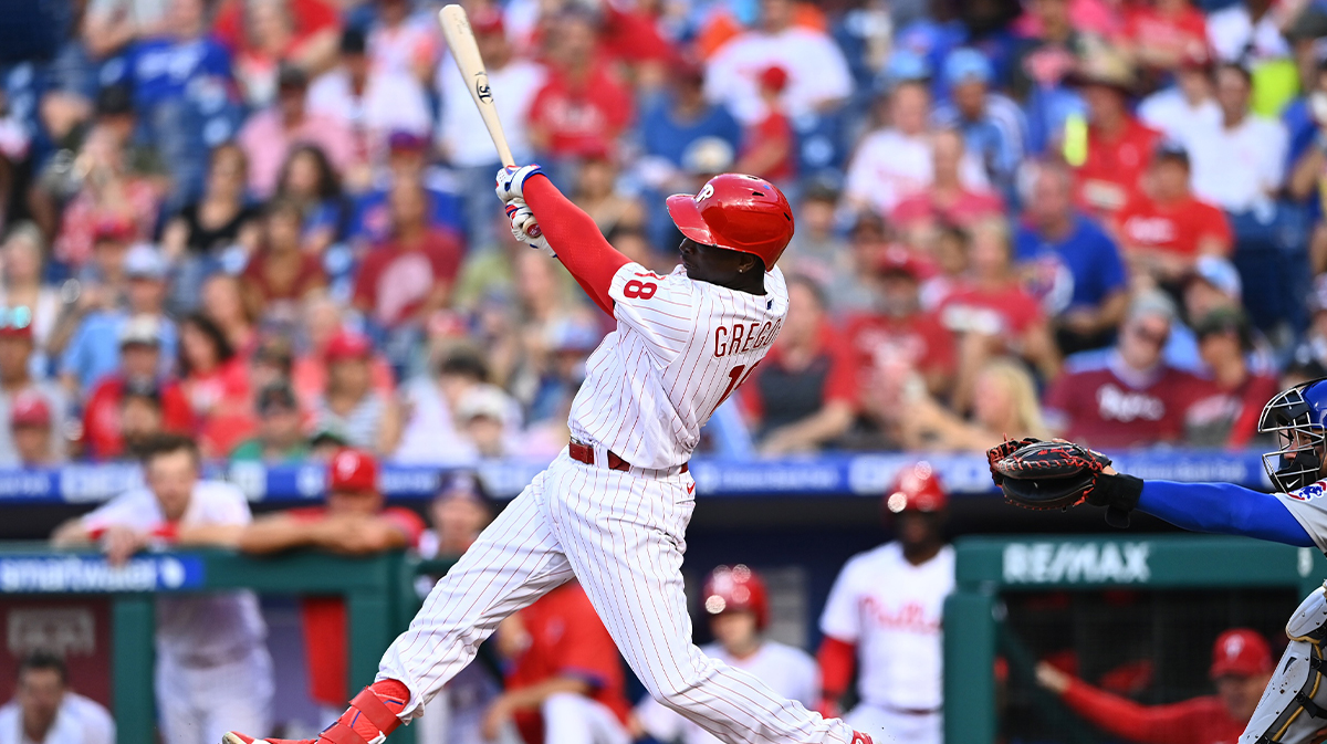 Jul 23, 2022; Philadelphia, Pennsylvania, USA; Philadelphia Phillies shortstop Didi Gregorius (18) hits a single against the Chicago Cubs in the fifth inning at Citizens Bank Park. 