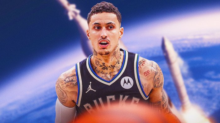 Kyle Kuzma with a rocket booster behind him.
