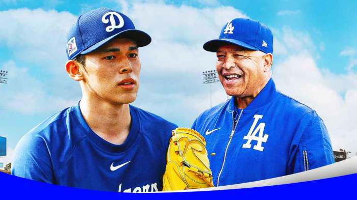 Dodgers' Dave Roberts smiling at Roki Sasaki