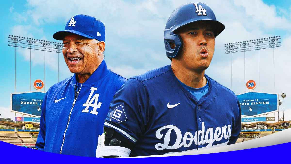 Dave Roberts standing next to Shohei Ohtani with his jaw dropped
