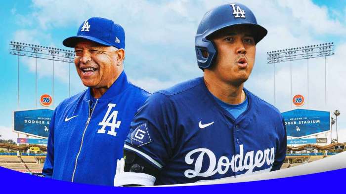Dave Roberts standing next to Shohei Ohtani with his jaw dropped