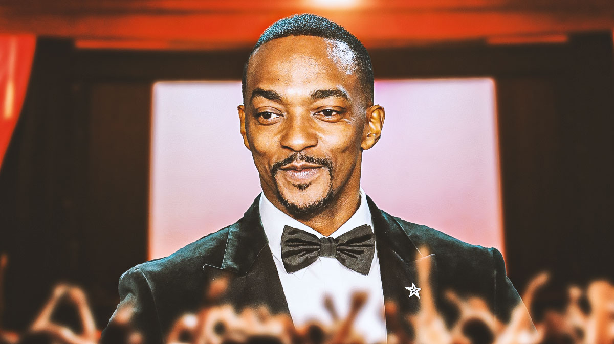 Captain America: Brave New World star Anthony Mackie, who appears in the Marvel movie's post-credits scene, with movie theater background.