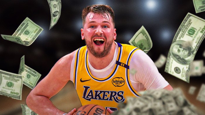 Luka Doncic laughing and flashing some money with a photo of the Hollywood sign in the background