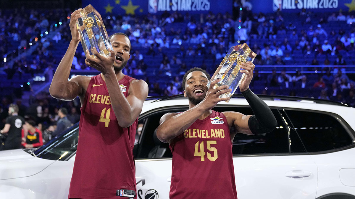 Team Cavs Center Evan Moblei (4) and the Donovan Mitchell (45) Cleveland Cavaliers is celebrated with trophies after winning the skill challenge during all stars in the evening in front of 2025 NBA All Garni Games in Chese Center.