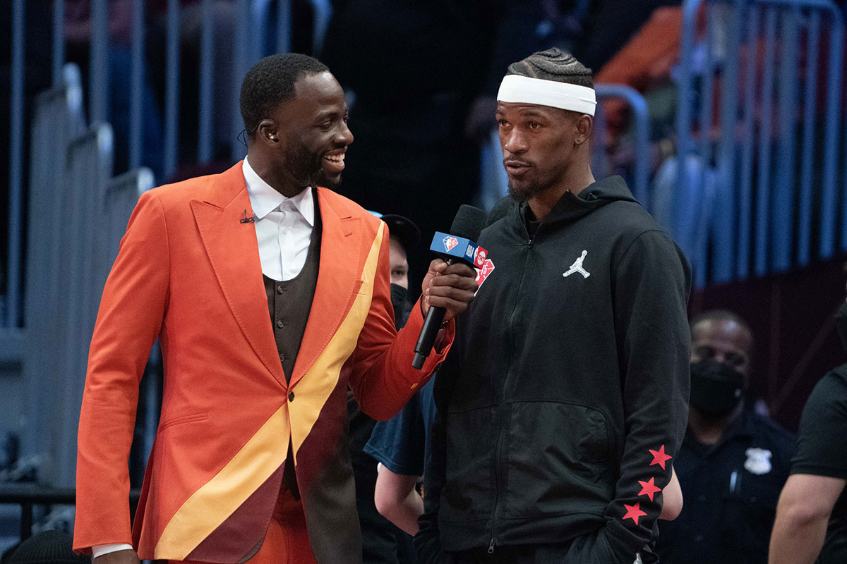 Team Durant forward Draymond Green of the Golden State Warriors (23, left) interviews Team LeBron forward Jimmy Butler of the Miami Heat (22) during the fourth quarter in the 2022 NBA All-Star Game at Rocket Mortgage FieldHouse. 