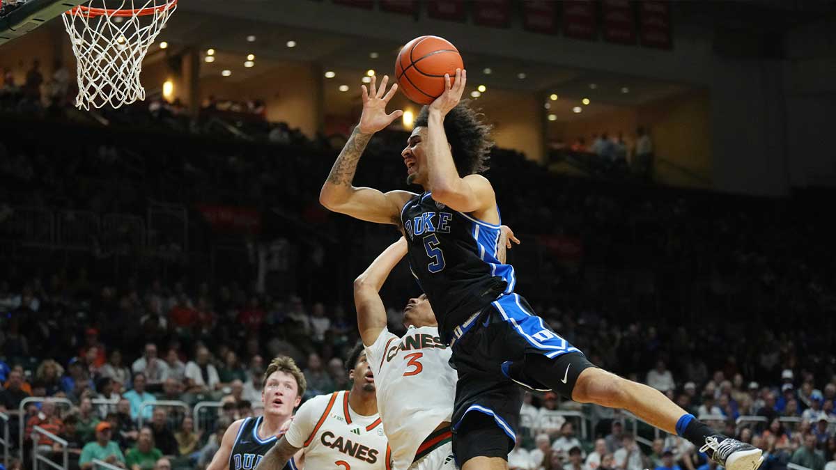 Duke Blue Devils guard Tyrese Proctor (5) gets fouled by Miami (Fl) Hurricanes guard Jalil Bethea (3) during the first half at Watsco Center.