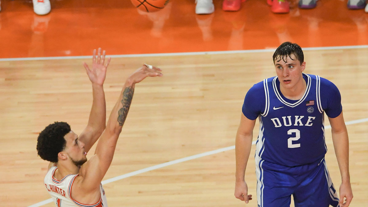 Clemson Tigers guard Chase Hunter (1) makes the 77th point on a free throw near Duke Blue Devils forward Cooper Flagg (2) during the second half at Littlejohn Coliseum.