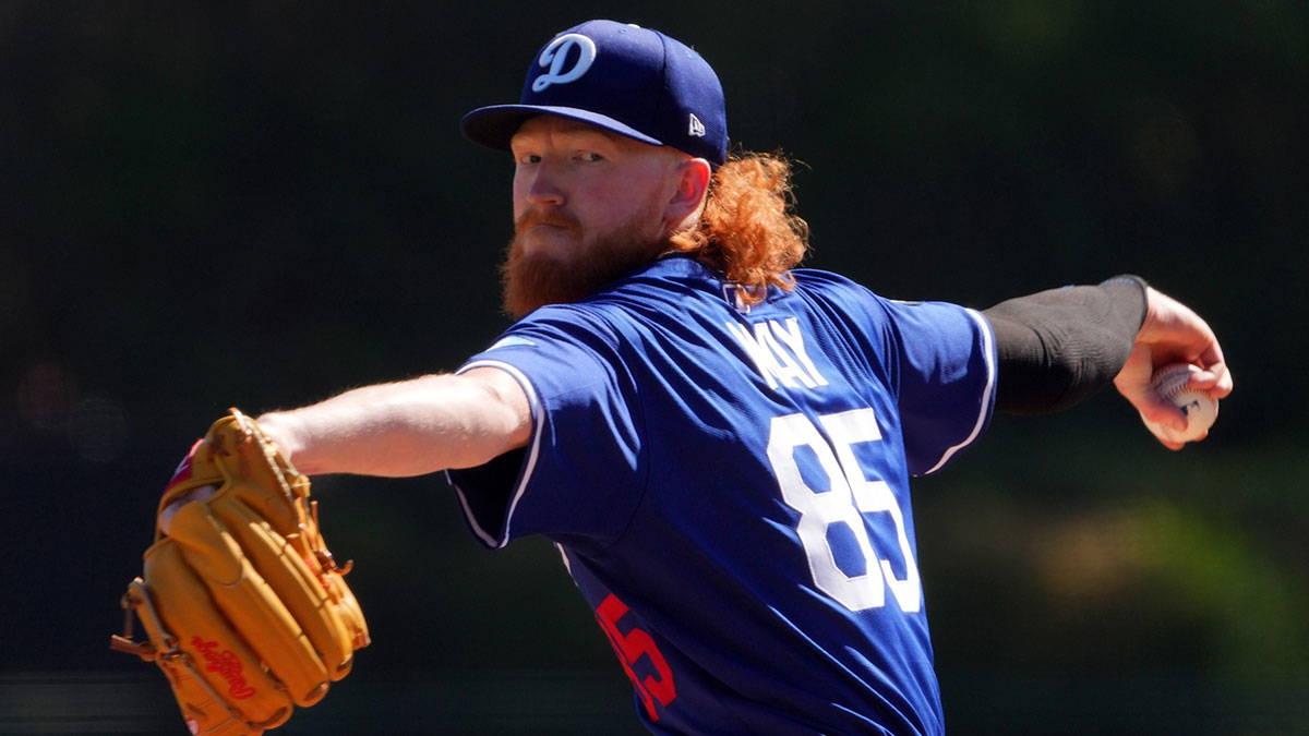  Los Angeles Dodgers pitcher Dustin May (85) pitches against the San Diego Padres during the first inning at Camelback Ranch-Glendale.