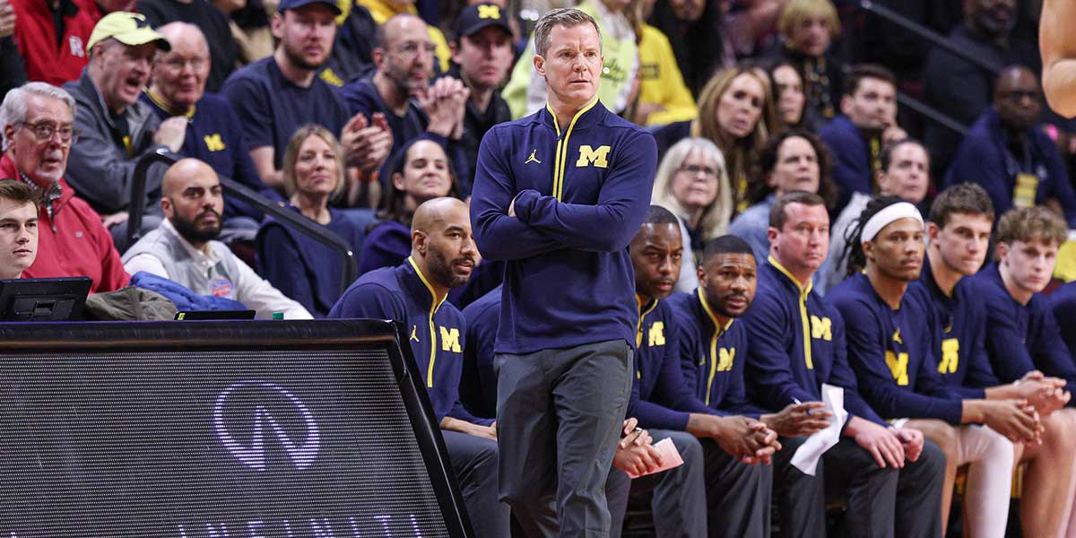 Michigan Wolverines head coach Dusty May looks on during the first half against the Rutgers Scarlet Knights at Jersey Mike's Arena.
