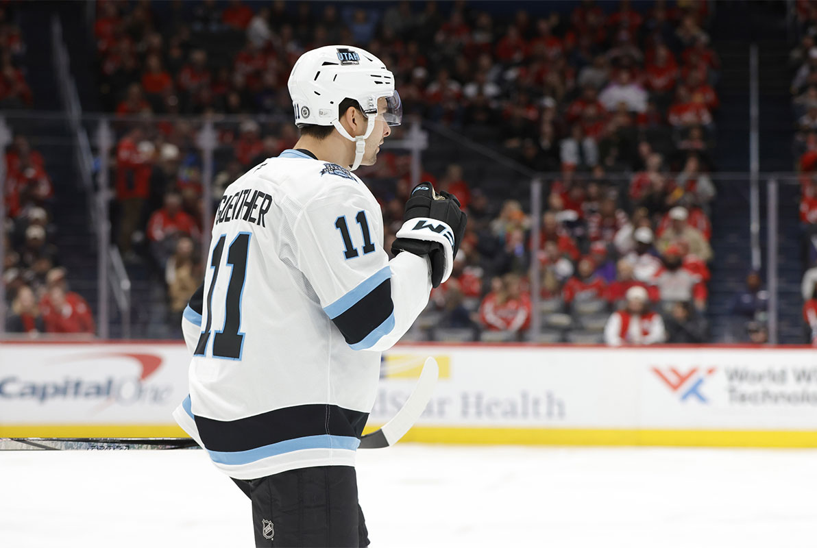 Utah Hockey Club right wing Dylan Guenther (11) celebrates after scoring a goal against the Washington Capitals during the second period at Capital One Arena.