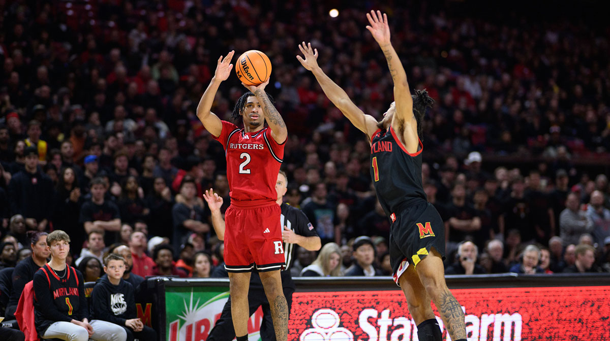 Rutgers Scarlet Knights guard Dylan Harper (2) takes a jump shot during the first half over Maryland Terrapins guard Rodney Rice (1) at Xfinity Center.