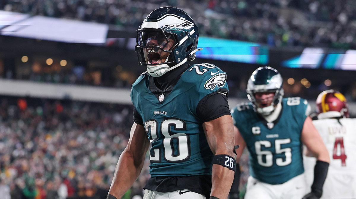 Jan 26, 2025; Philadelphia, PA, USA; Philadelphia Eagles running back Saquon Barkley (26) celebrates after a touchdown against the Washington Commanders during the second half in the NFC Championship game at Lincoln Financial Field. Mandatory Credit: Bill Streicher-Imagn Images
