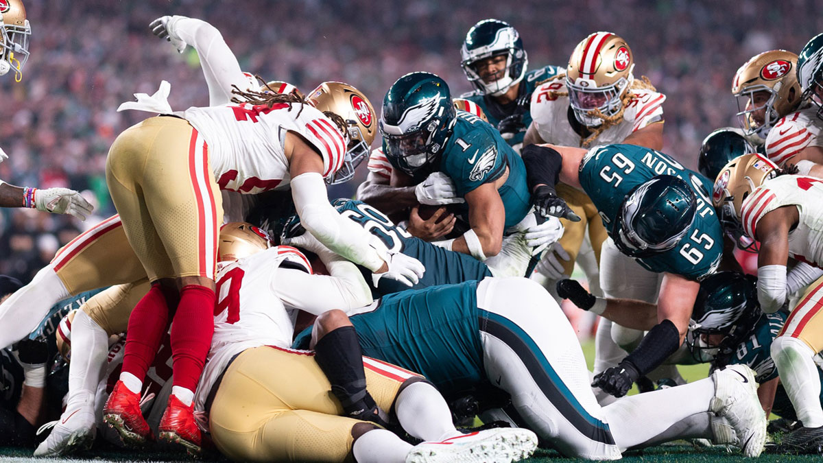 Philadelphia Eagles quarterback Jalen Hurts (1) scores a touchdown on a sneak play against the San Francisco 49ers during the third quarter at Lincoln Financial Field.