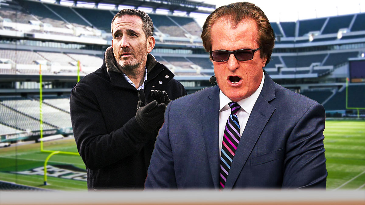 Mel Kiper Jr next to Howie Roseman in front of the Eagles stadium