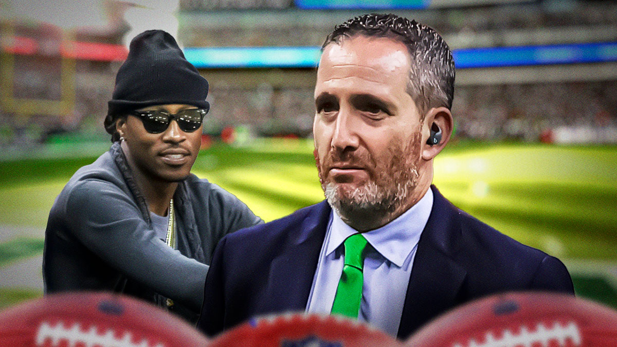 Howie Roseman dances next to a smiling Future