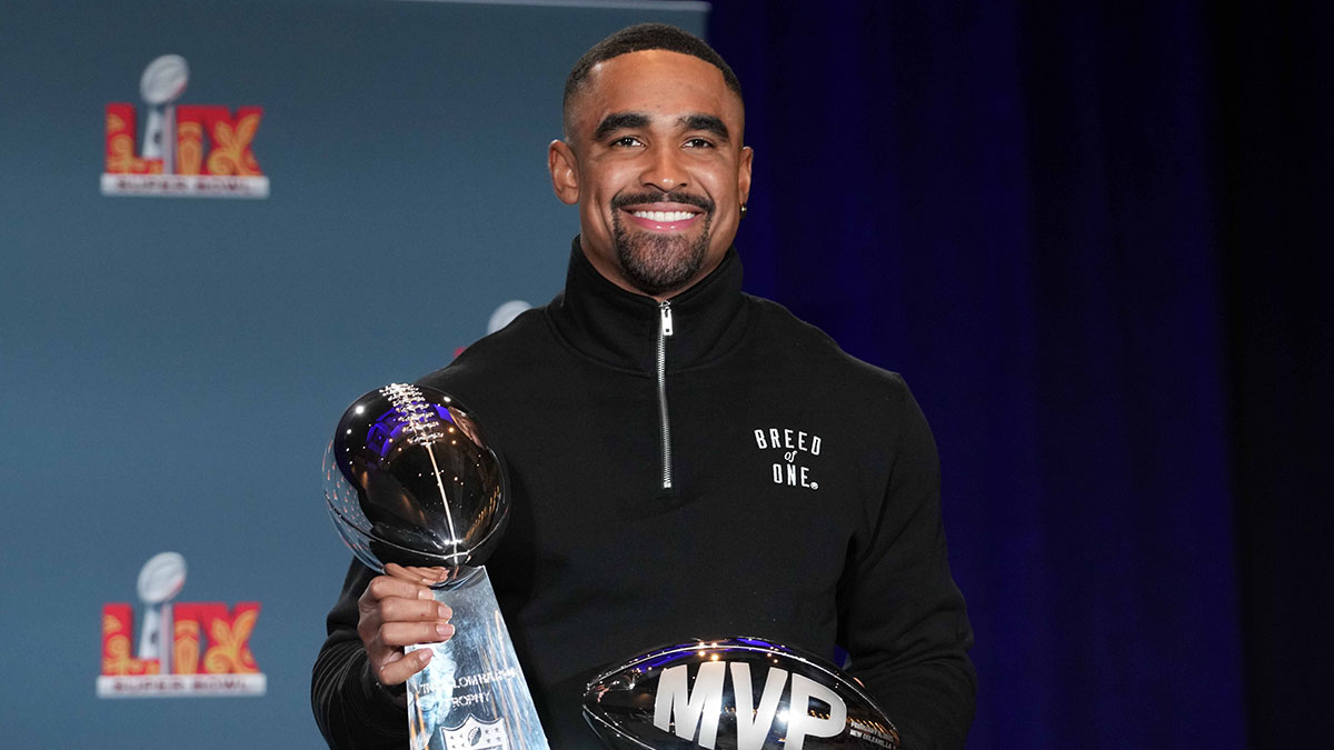 Philadelphia Eagles quarterback Jalen Hurts (1) poses with the Vince Lombardi trophy at the Super Bowl LIX Winning Head Coach and Most Valuable Player press conference at the Ernest N. Morial Convention Center.