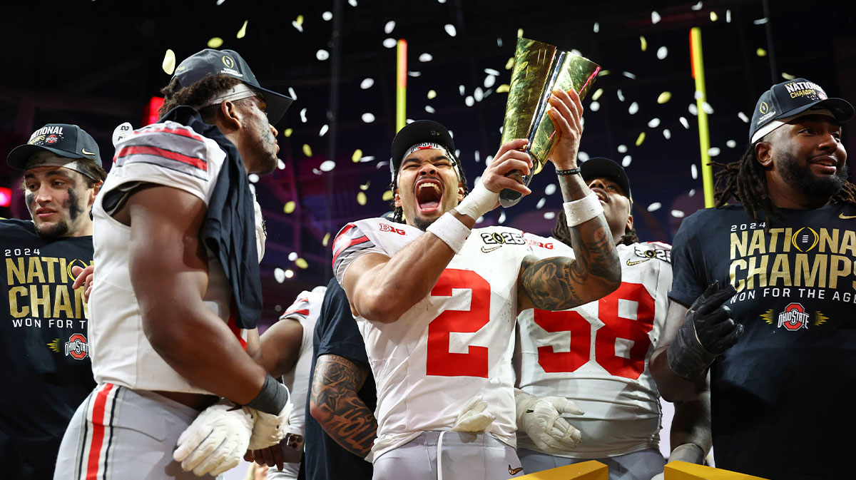 Ohio State Buckeyes wide receiver Emeka Egbuka (2) celebrates after winning against the Notre Dame Fighting Irish in the CFP National Championship college football game at Mercedes-Benz Stadium.