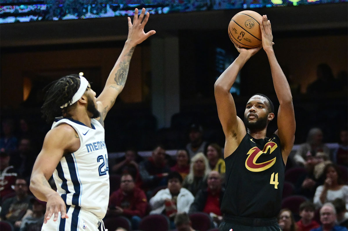 Cleveland Cavaliers forward Evan Mobley (4) shoots over the defense of Memphis Grizzlies forward Lamar Stevens (24) during the first half at Rocket Mortgage FieldHouse.