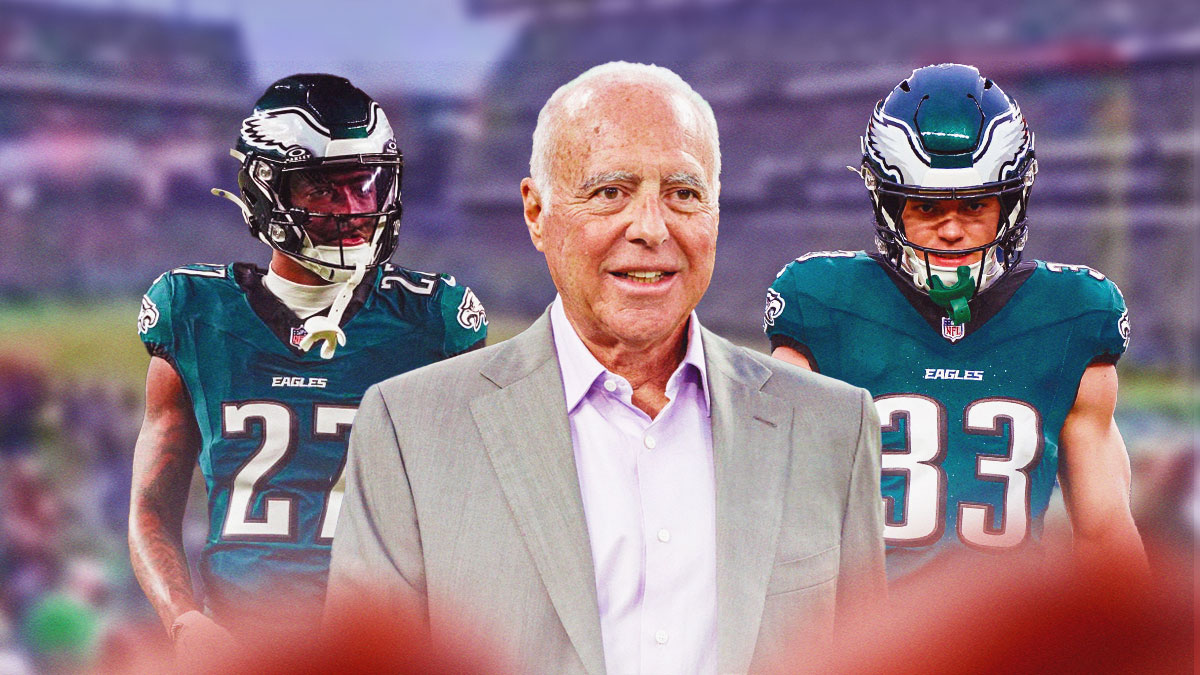 Jeffrey Lurie with Quinyon Mitchell on his left and Cooper DeJean on his right.