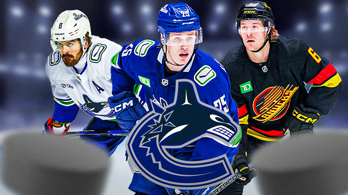 Elias Pettersson in middle, Brock Boeser and Conor Garland on either side, Vancouver Canucks logo, hockey rink in background