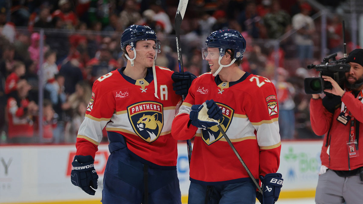 Florida Panthers left wing Matthew Tkachuk (19) and center Carter Verhaeghe (23) celebrate after the game against the Ottawa Senators at Amerant Bank Arena.