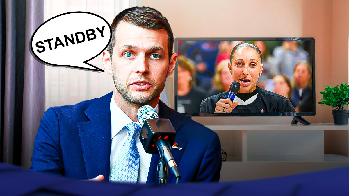 Mercury general manager Nick U’Ren with a thought bubble that says “Standby” with a TV next to him that has Diana Taurasi’s headshot on the screen.