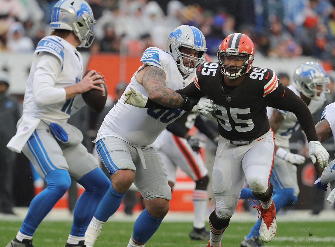 Browns defensive end Myles Garrett rushes Lions quarterback Tim Boyle during the second quarter on Sunday, Nov. 21, 2021 in Cleveland.