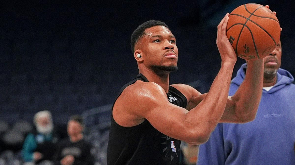 Feb 5, 2025; Charlotte, North Carolina, USA; Milwaukee Bucks forward Giannis Antetokounmpo (34) shoots during pregame warm ups against the Charlotte Hornets at Spectrum Center.