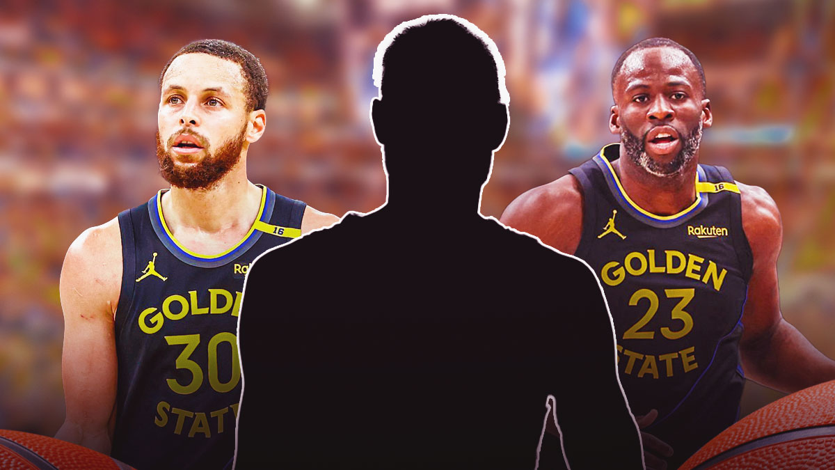 Stephen Curry, Draymond Green, and the blacked-out silhouette of Nikola Vucavic on the Warriors court.