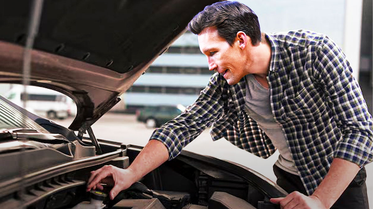 Mike Dunleavy Jr. (Warriors GM) as a man fixing a car