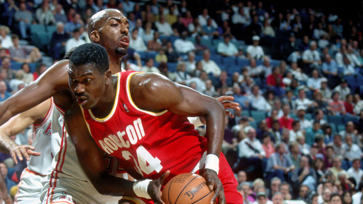 CENTER HUSTON ROCKETS # 34 Hakeem Olajuvon in action against John Salley of Miami heat in Miami Arena during the 1994-95 season.