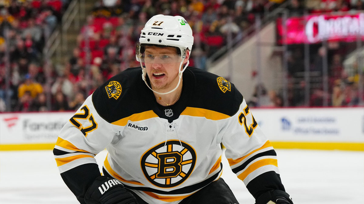 Boston Bruins defenseman Hampus Lindholm (27) skates against the Carolina Hurricanes during the third period at Lenovo Center.