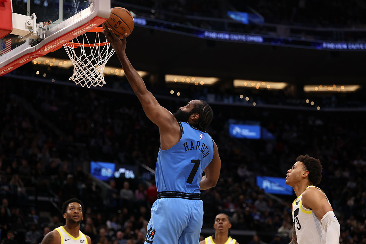 Los Angeles Clippers Guard James Harden (1) goes to the basket of last Utah Jazz Guard Keionte George (3) during the third quarter at Intuit Dome.