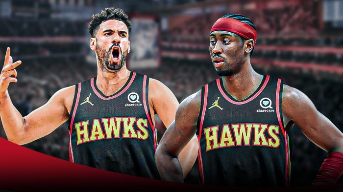 Georges Niang and Caris LeVert in Hawks jerseys.