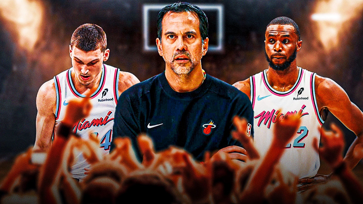Miami Heat head coach Erik Spoelstra in the middle with Tyler Herro and Andrew Wiggins on either side in front of Kaseya Center.