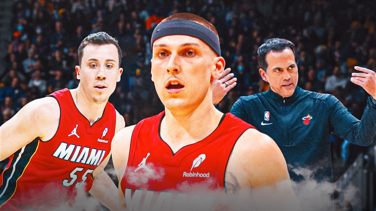 Miami Heat star Tyler Herro in the center with Duncan Robinson and Erik Spoelstra on either side in front of Kaseya Center.