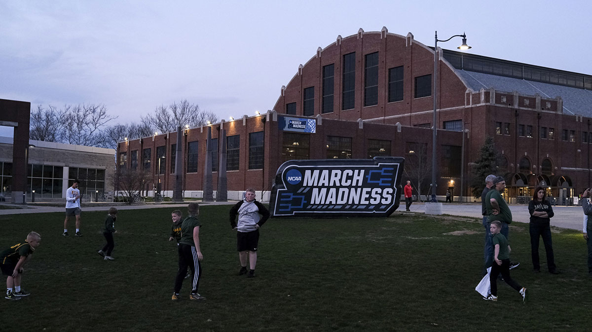 Spectators hang outside of Hinkle Fieldhouse honoring Gene Hackman death before a game between the Syracuse Orange and the Houston Cougars in the Sweet Sixteen of the 2021 NCAA Tournament.