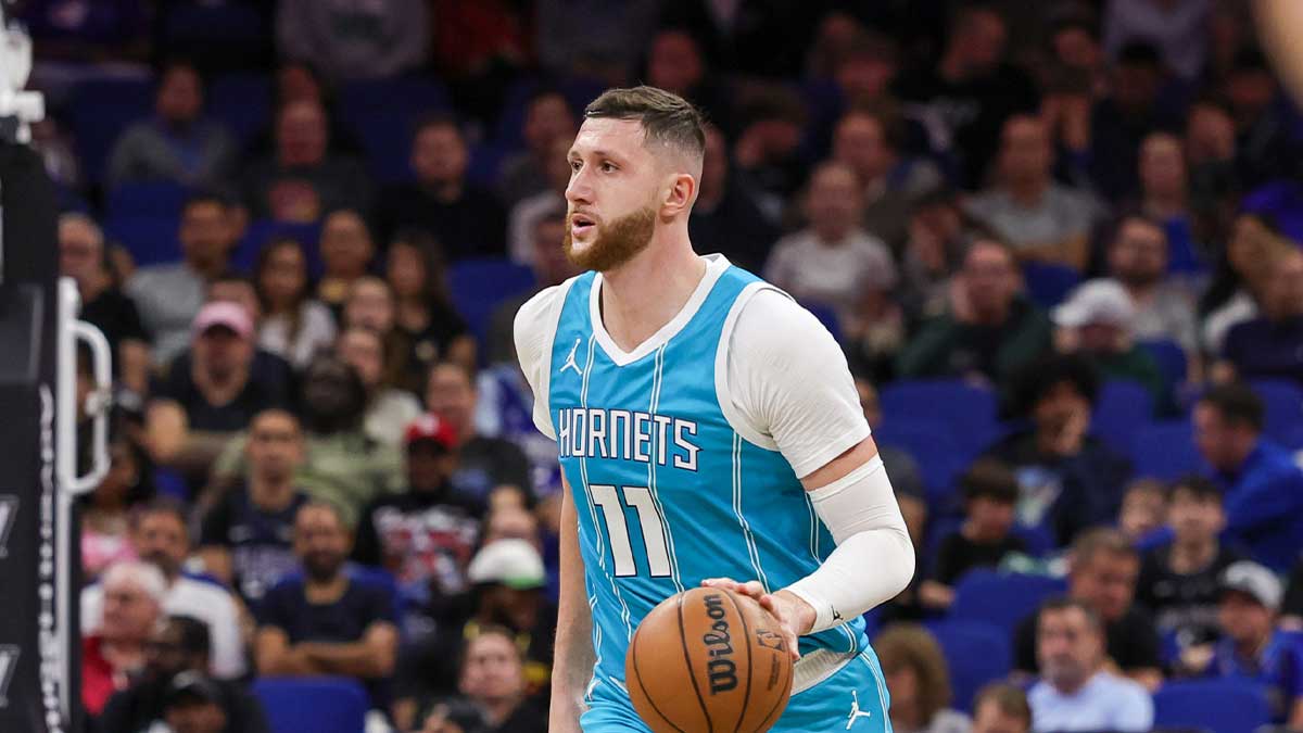 The center of Charlotte Hornets, Jusuf Nurkic (11), brings the land during the second quarter against Orlando Magic to the Kia Center.