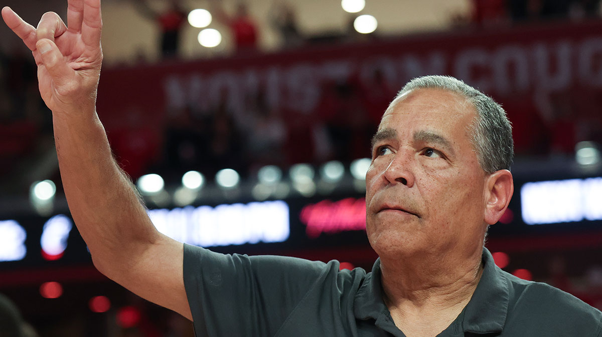 Houston Cougars head coach Kelvin Sampson sings the school song after defeating the Iowa State Cyclones in the second half at Fertitta Center.