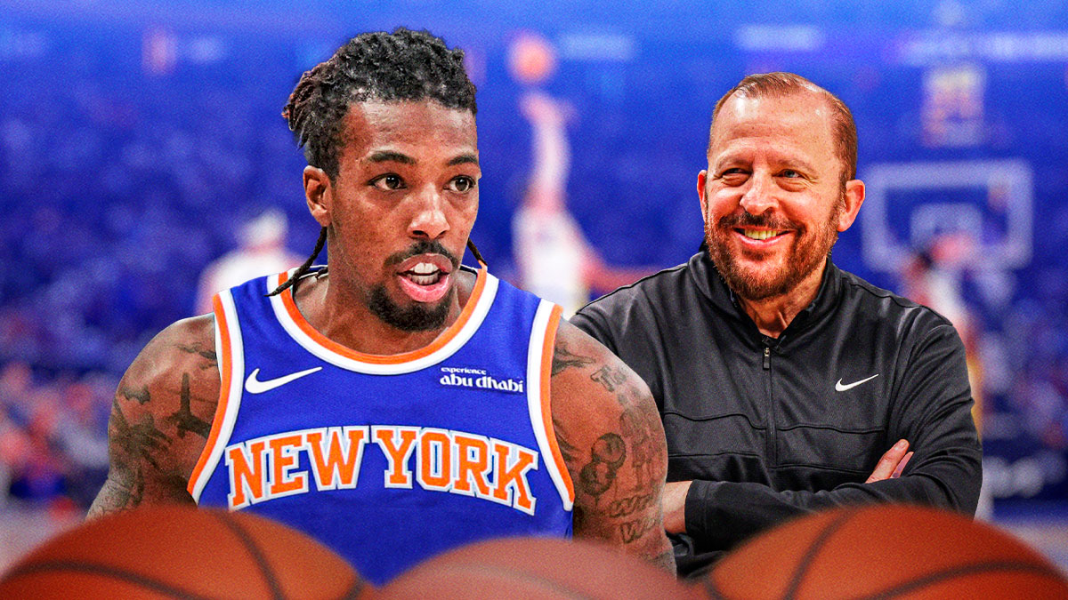 Delon Wright in a defensive stance in a Knicks' jersey with Tom Thibodeau smiling