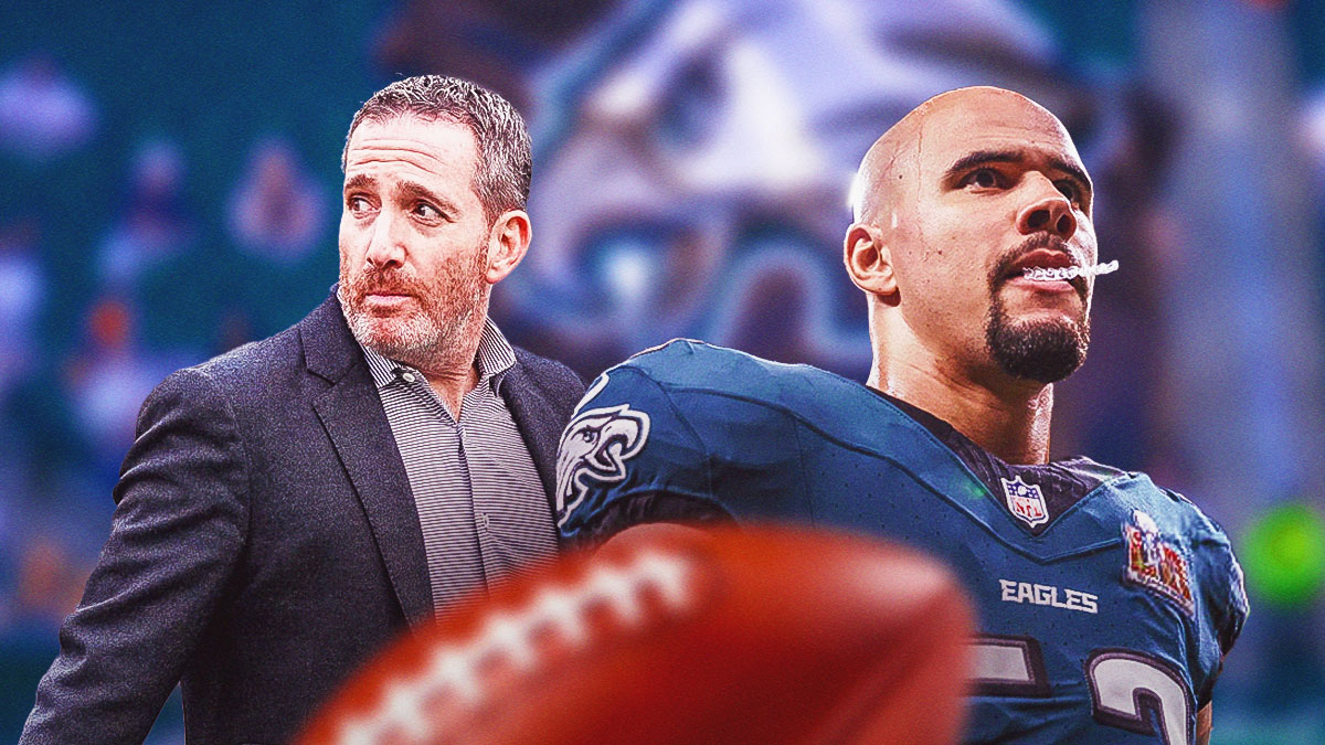 Howie Roseman next to Zack Baun in front of the Eagles stadium.