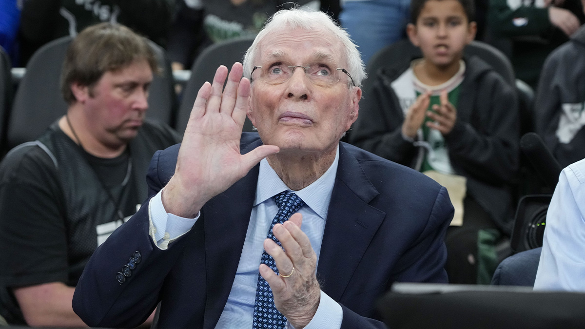 ESPN Broder Hubie Brown recognizes a multitude after he honors a video presentation during the first quarter of the game between Filadelphia 76ers and Milwaukee Bucks at Fiserv Forum.