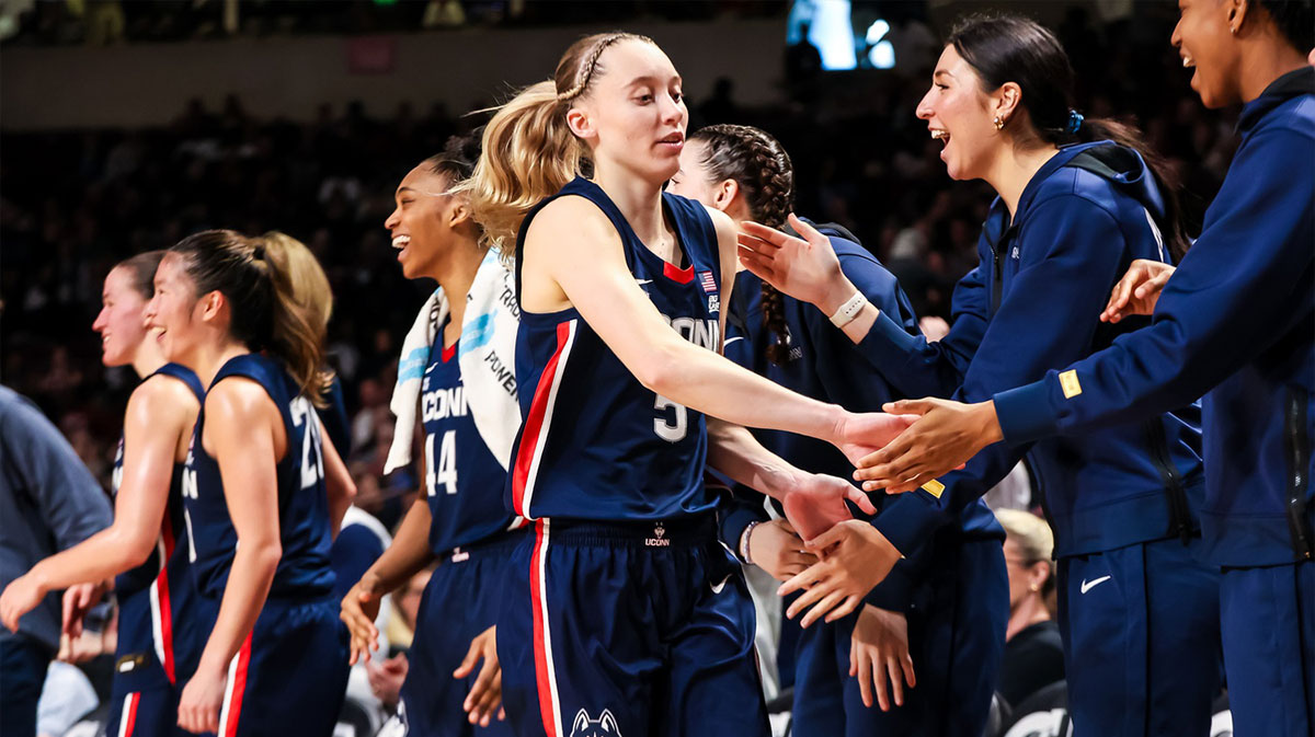 UConn Huskies guard Paige Bueckers (5) is congratulated after being pulled from the game against the South Carolina Gamecocks in the second half at Colonial Life Arena.