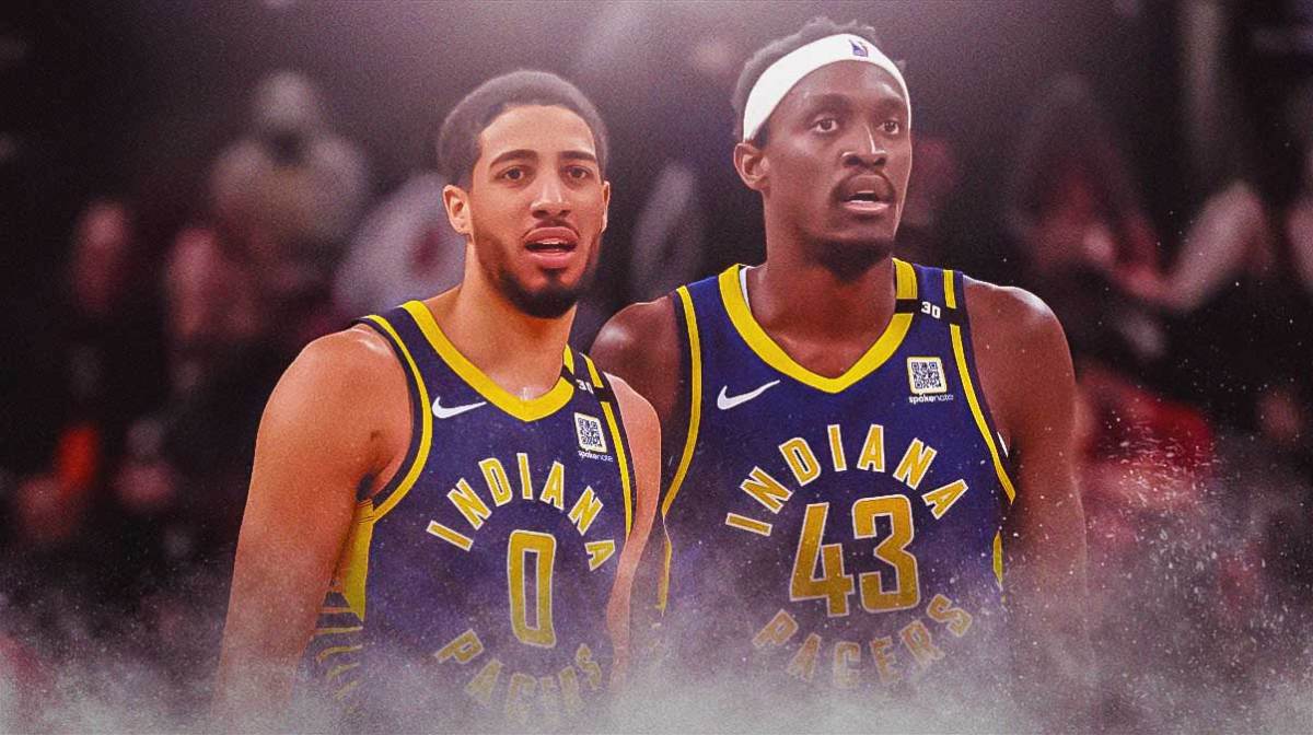 Indiana Pacers players Pascal Siakam and Tyrese Haliburton with the Pacers arena in the background