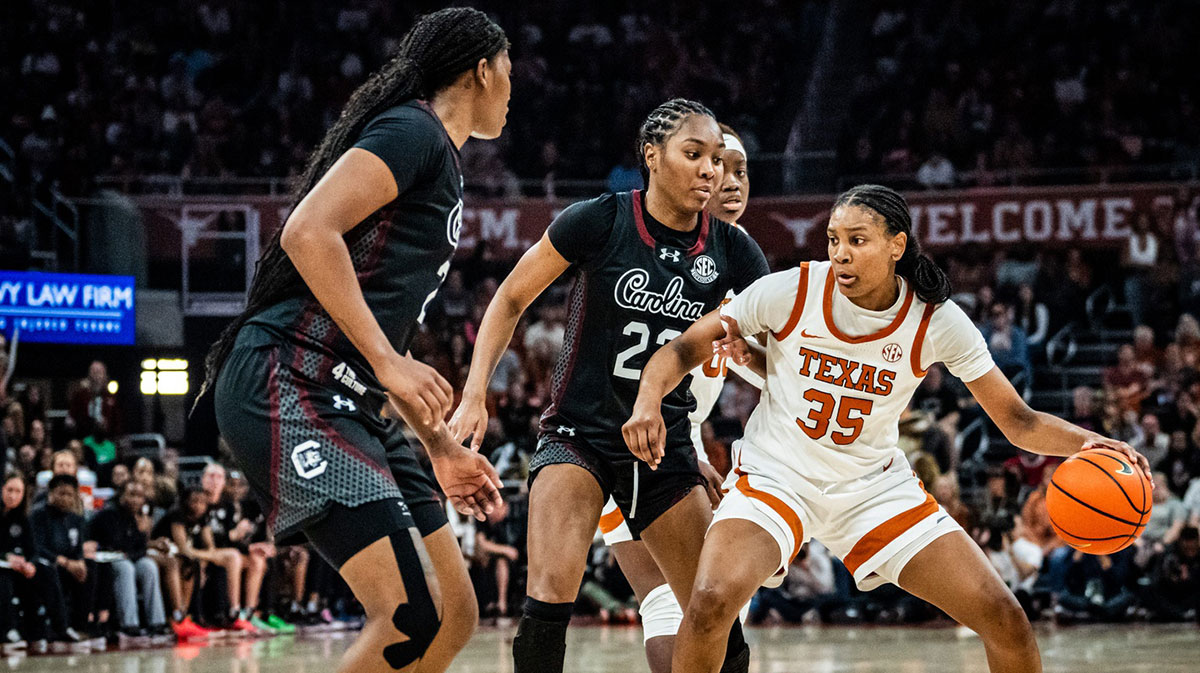 Texas Longhorns forward Madison Booker (35) drives into the let around South Carolina Gamecocks defense in the second half as the Longhorns take on the Gamecocks at the Moody Center, Feb. 9, 2025. Texas won the game 66-62.