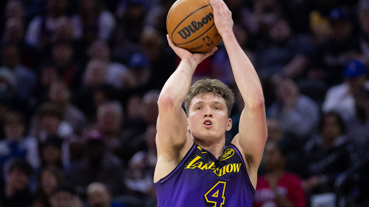 Los Angeles Lakers guard Dalton Knecht (4) shoots against the Philadelphia 76ers during the second quarter at Wells Fargo Center.