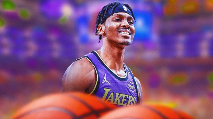 LA Lakers player Christian Koloko with the LA Lakers arena in the background, G League South Bay