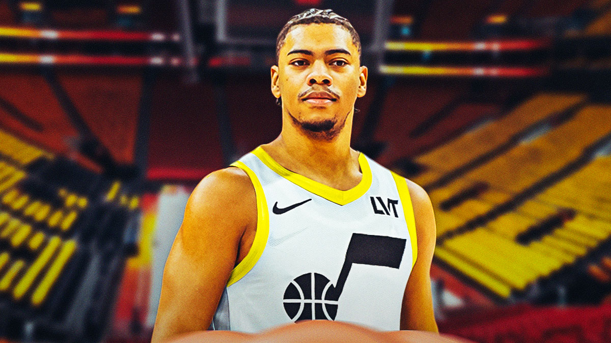 NBA player Jaden Springer in a Utah Jazz jersey with the Jazz arena in the background, contract roster