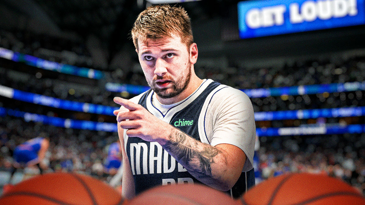 NBA player Luka Doncic in his old Dallas Mavericks jersey with the Mavericks arena in the background, fans mural