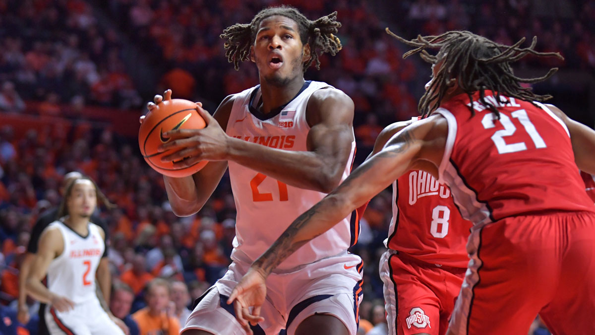 Illinois Fighting Illini forward Morez Johnson Jr. (21) goes to the basket as Ohio State Buckeyes forward Devin Royal (21) defends during the first half at State Farm Center.